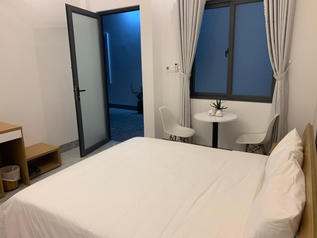 Phòng Có Giường Cỡ Queen Nhìn Ra Vườn - P'House Hotel