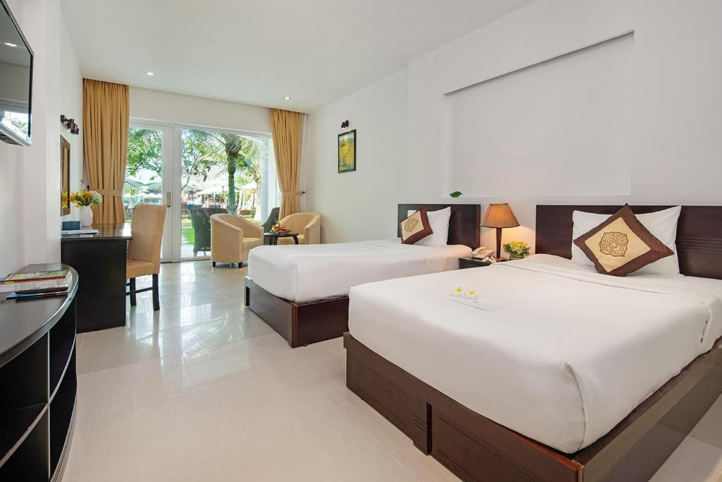Phòng Deluxe  - The Sailing Bay Beach Resort