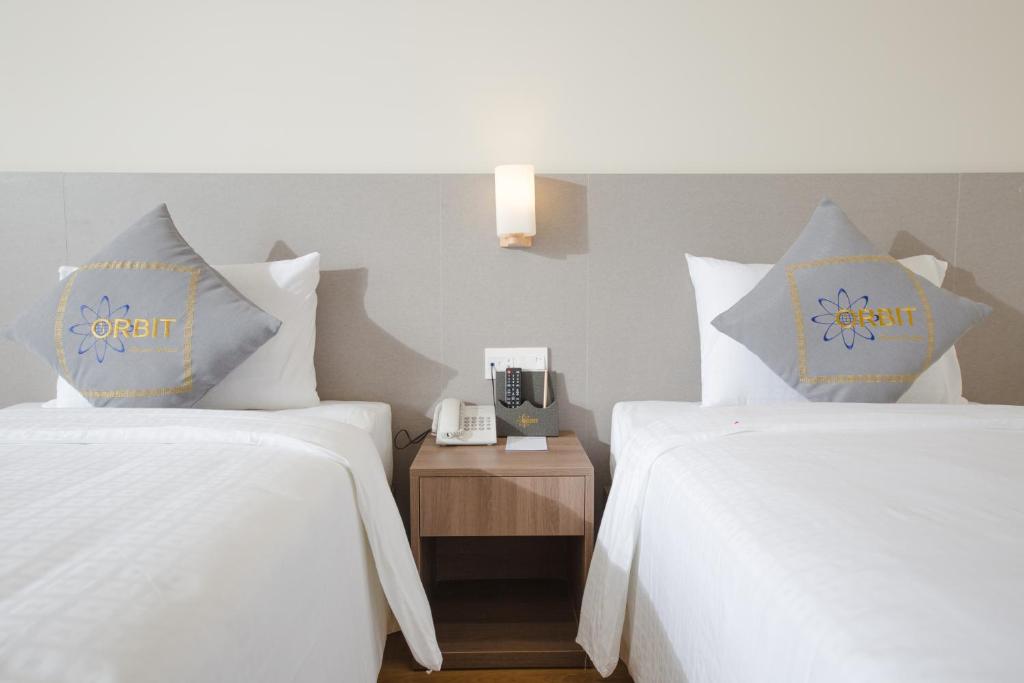 Phòng Giường Đôi/2 Giường Đơn Nhìn Ra Biển - ORBIT Resort & Spa