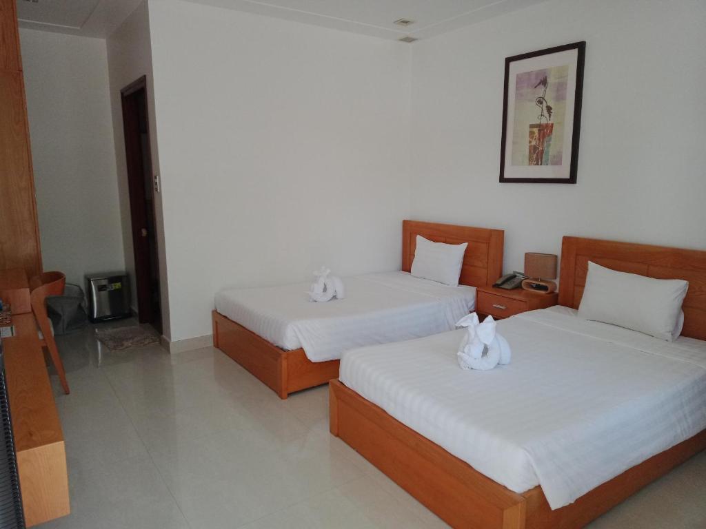 Phòng 2 Giường Đơn Nhìn Ra Hồ - Khách sạn Qli