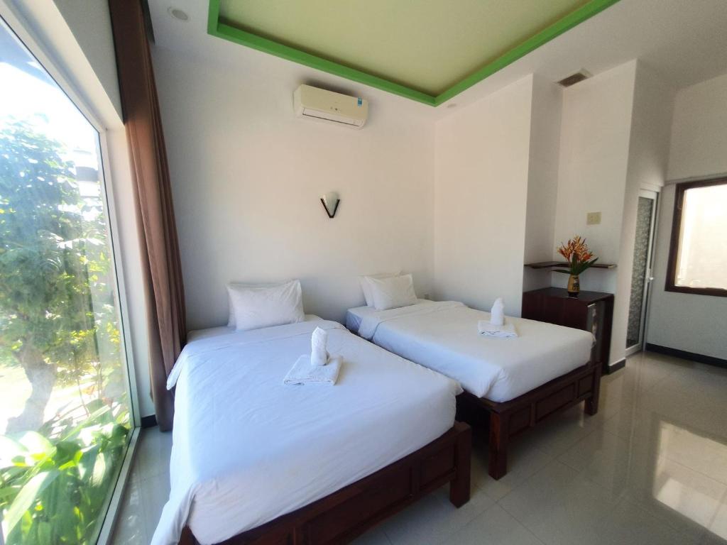 Phòng 2 Giường Đơn Nhìn Ra Khu Vườn - Tuong Vy Boutique Hotel Mui Ne