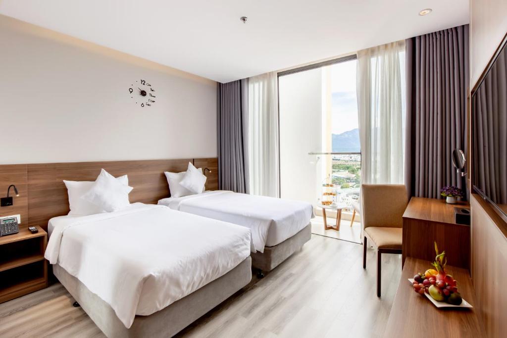 Phòng Gia Đình Có Ban Công - Merlot Hotel Nha Trang