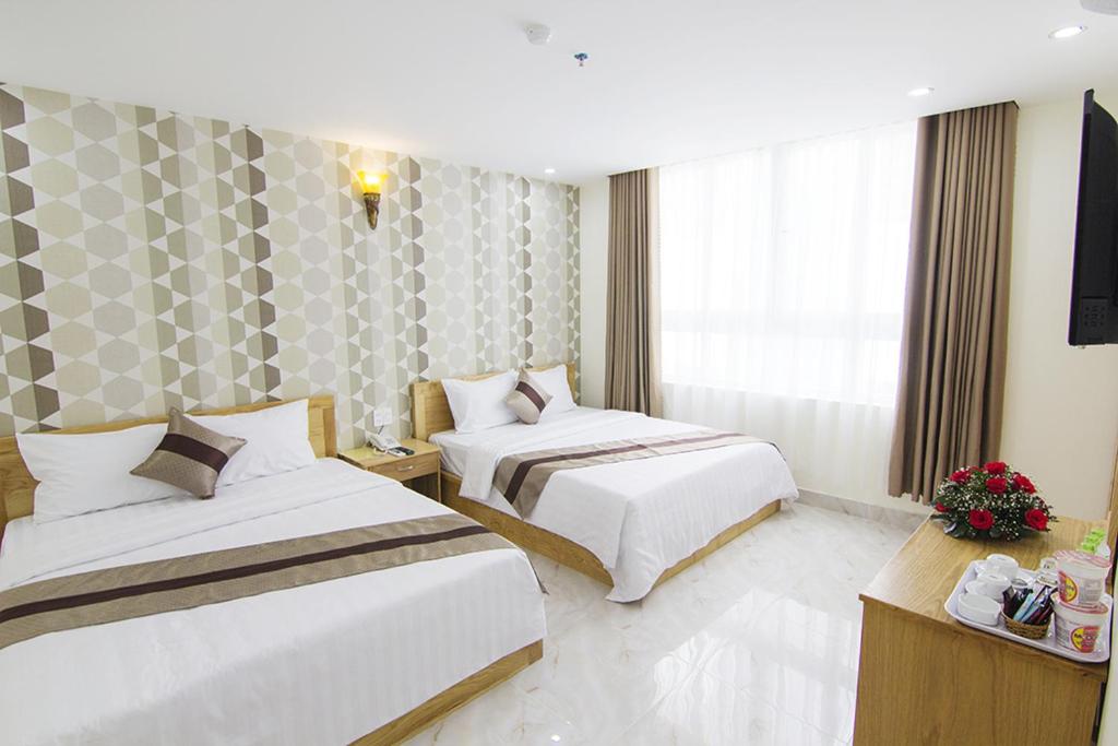 Phòng Deluxe Gia đình - Ngọc Hạnh Beach Hotel