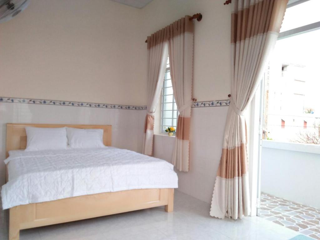 Phòng Deluxe Có Giường Cỡ Queen - Nhà nghỉ Hạnh Minh