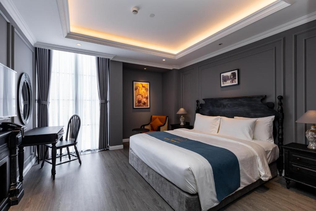 Phòng Deluxe Giường Đôi Có Ban Công - Khách sạn Kim Minh