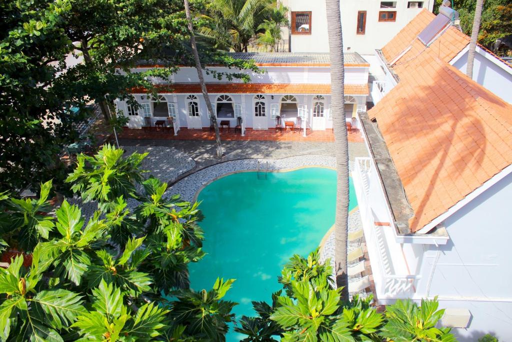 Phòng Giường Đôi Nhìn Ra Biển - Sand Beach Resort