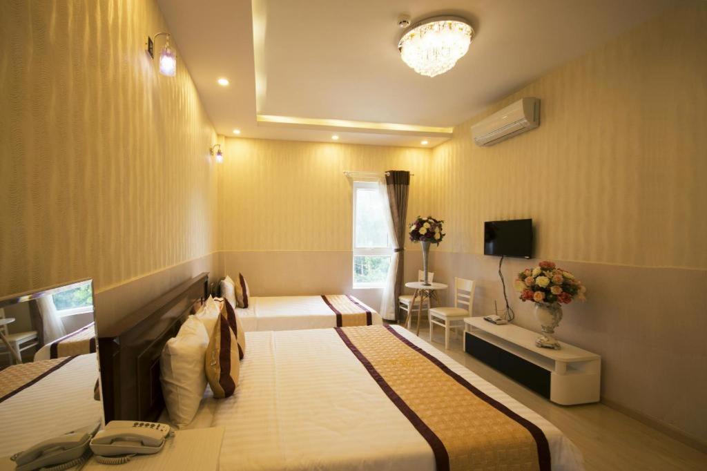 Phòng Deluxe cho 3 Người - GODIVA HOTEL