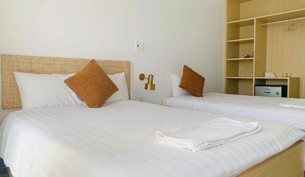 Phòng cho 3 người có Ban Công - Flora Hotel - Phan Rí Cửa