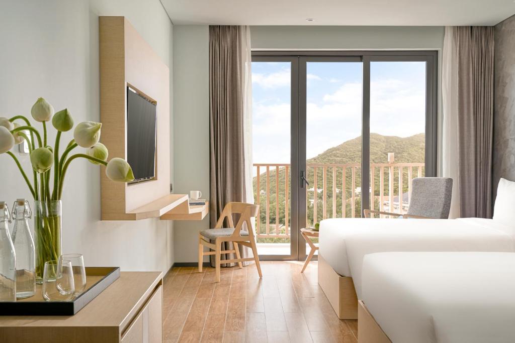 Phòng Deluxe 2 Giường Đơn có Ban Công và Nhìn Ra Thành Phố - The Secret Côn Đảo